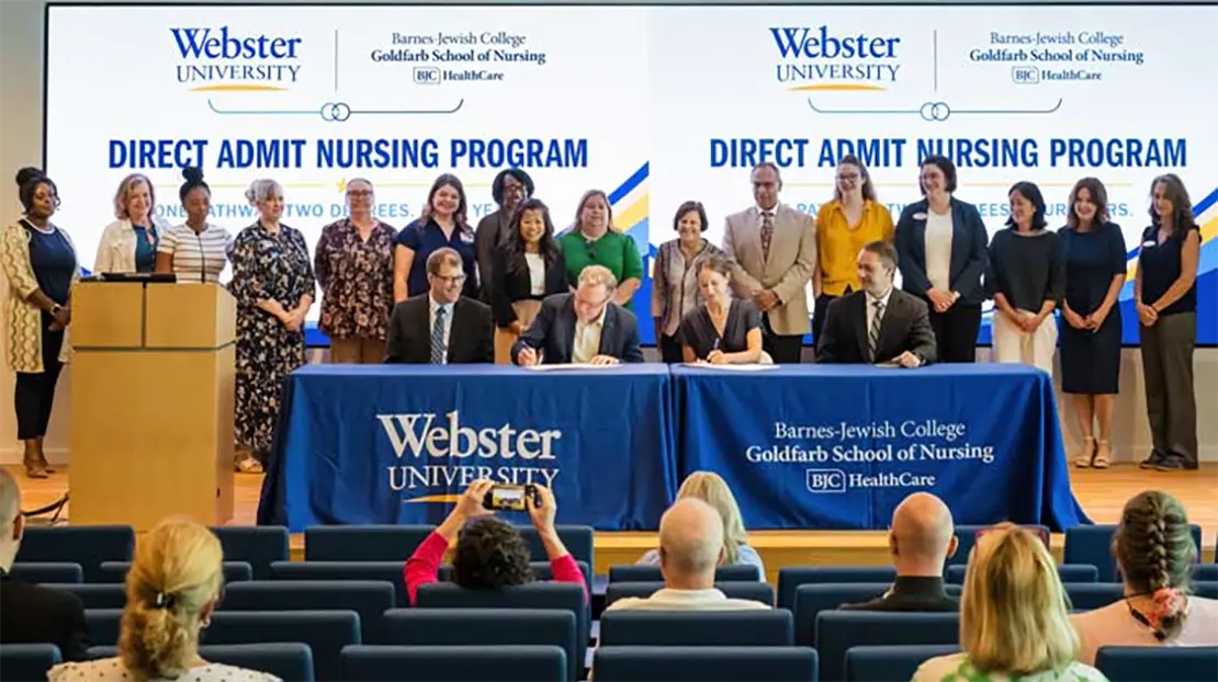Webster and Washington University representative sign new BSN agreement.
